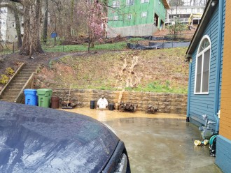 CAN'T HOLD BACK: Failing silt fences above Mark deVerges' property on Sunset Drive have deposited muddy water on his driveway and patio for the past year, deVerges says. Photo courtesy of Mark deVerges