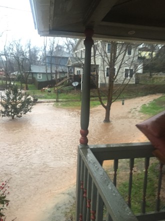 WHATEVER FLOATS YOUR BOAT: In a heavy rain, Nina Hart says, water running down Wellington Street turns her front yard into something more akin to a river or lake. Photo courtesy of Nina Hart