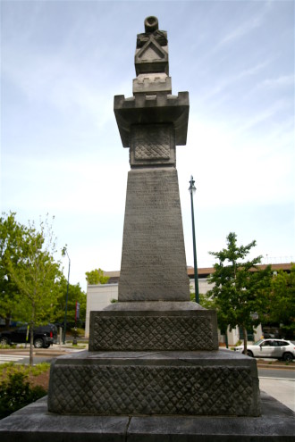 POSITIONS OF POWER: Just as controversial as the historical figures they memorialize, the locations of Confederate monuments often tell a sordid tale of their own, says historian Darin Waters. Often, Confederate monuments were placed near the center of town or outside courthouses, like the one commemorating Confederate regiments from WNC that sits outside the Buncombe County courthouse (above). Photo by Max Hunt