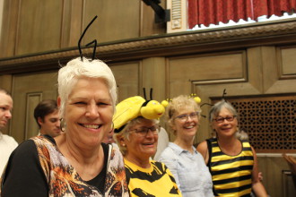 BEE LOVERS: Bee City USA supporters were on hand on June 13 to mark Asheville Mayor Esther Manheimer's proclamation of June as pollinator month in the city of Asheville. Photo by Virginia Daffron