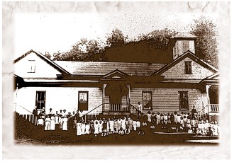 BUSTLING COMMUNITY: Logging booms brought an influx of new residents to the area after the turn of the century. Shown here is the Proctor School in the 1920s. Photo provided by Daniel Pierce
