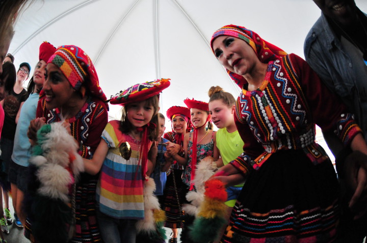 WITHOUT BORDERS: Performers from Peru Multicolor find common ground with Haywood County children last year. "The one thread we share is folk dance," says State Rep. Joe Sam Queen. "Dance allows us to welcome the world to our very own Main Street."