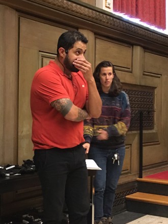 FOUND IN TRANSLATION: Spanish-language interpreter Luis Serapio, left, and his colleague provided simultaneous translation at the May 23 meeting of Asheville City Council. Photo by Virginia Daffron