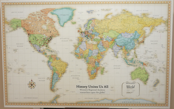 ALL AROUND THE WORLD: A map at the Western Regional Archives highlights the various locations its visitors arrive from. Photo by Thomas Calder