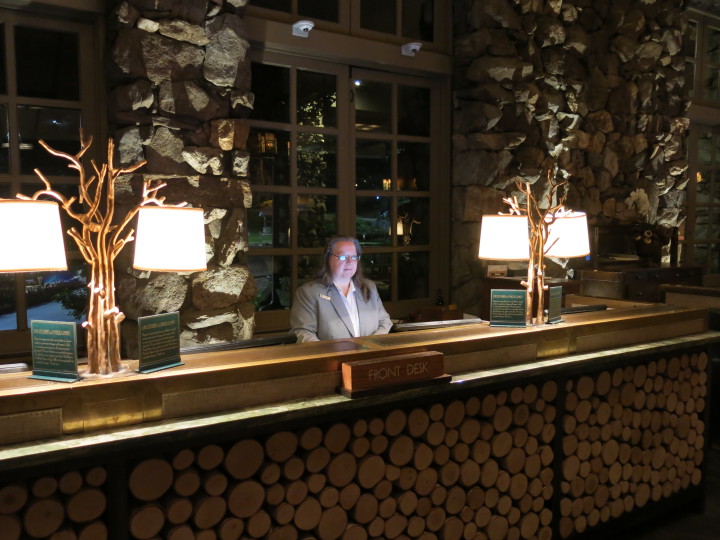 NIGHT AUDITOR: Norma Justus checks in late night arrives at the Grove Park Inn. Photo by Thomas Calder 