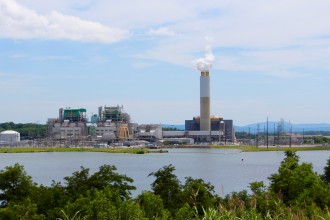BIG EXPENSES: Duke is building two natural gas-fueled electric generating units at Lake Julian south of Asheville to replace its existing coal plant. Duke estimates that project will have an $890 million price tag and the cost to close coal ash basins there will be about $422 million. Photo by Virginia Daffron