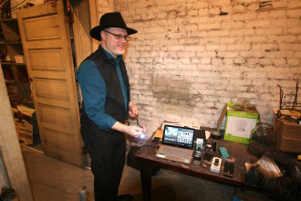 TOOLS OF THE TRADE: Joshua P. Warren displays the array of electronic tools and devices being used for the Masonic Temple investigation. Photo by Max Hunt
