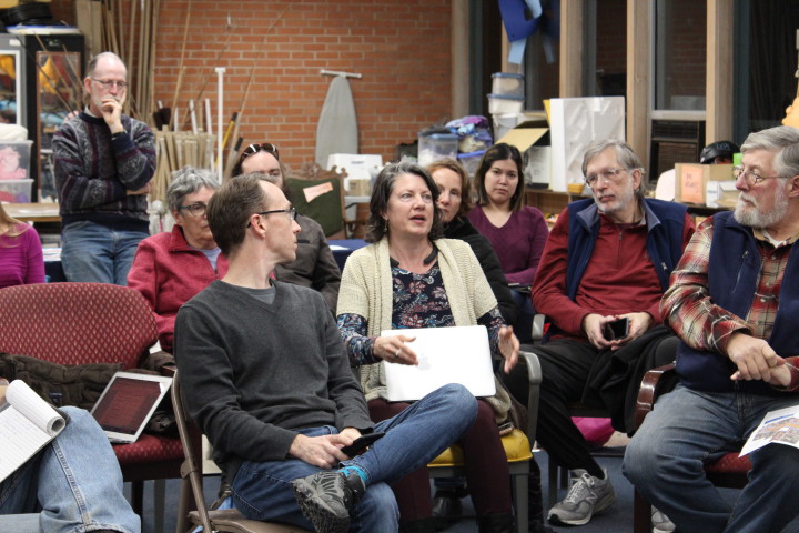 GET IT TOGETHER: Amy Kemp (center) of the Coalition of Asheville neighborhoods spoke of the need for residents across the city to collaborate to have an impact on planning for projects that will determine the city's future. Photo by Virginia Daffron