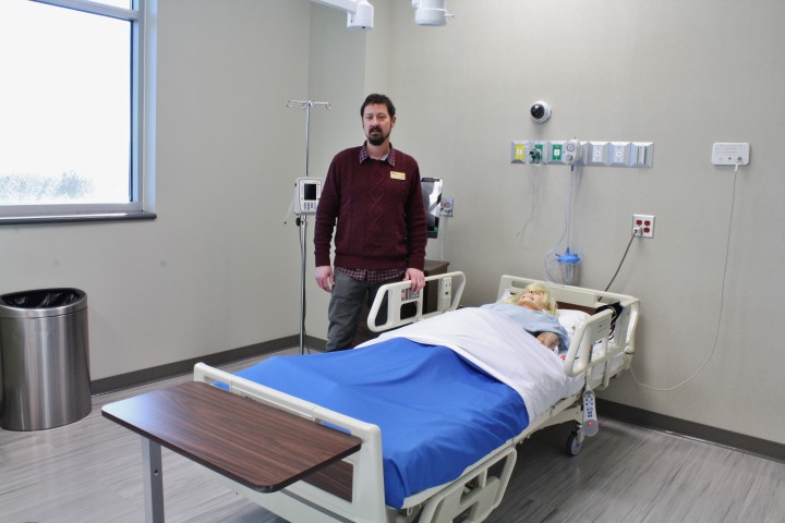 MORE OPTIONS: A-B Tech nursing faculty member Brent Evans explains that higher education is one way to prevent nursing burnout by giving nurses more job options. "Nursing has been and is becoming more and more a dynamic and varied profession," he says. Photo by Kari Barrows