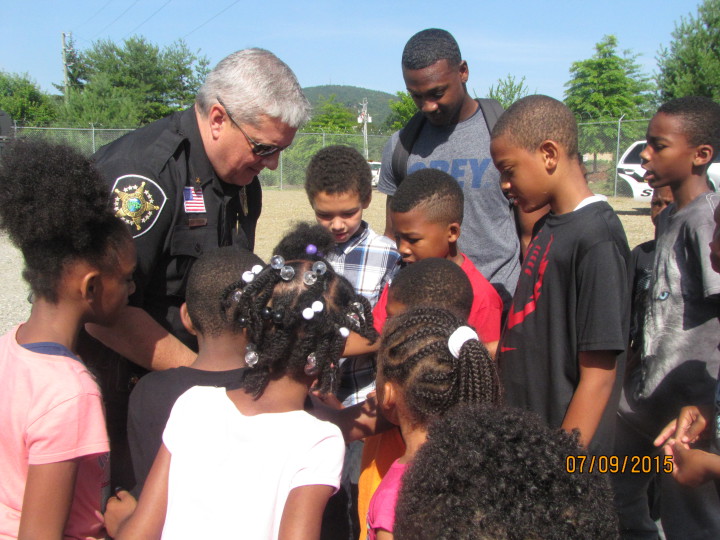 COMMUNITY POLICING: Duncan has supported programs like Project Lighten Up, a summer educational program for low-income and minority youths which aims to combat summer learning loss. The Law Enforcement Career Day introduces young people to police and some of their equipment. Photo courtesy of Buncombe County Sheriff’s Department