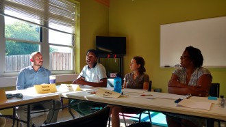 Mychal Bacoate, middle left, shares his views with fellow Human Relations Commission of Asheville members Patrick Conant and Ashley Cooper, as well as city Equity and Inclusion Manager Kimberlee Archie.