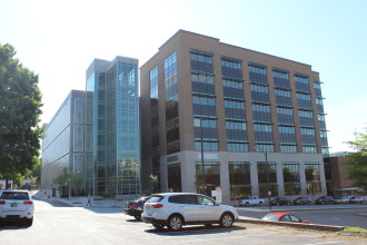 SOCIAL STRUCTURE: A new building and parking garage at the Buncombe County Health and Human Services Department facility on Coxe Avenue in downtown Asheville added $xxx to the county's debt. Photo by Virginia Daffron