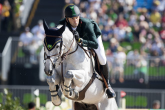 Eduardo Menezes of Brazil in a jumping competition. Photo courtesy of Tryon International Equestrian Center