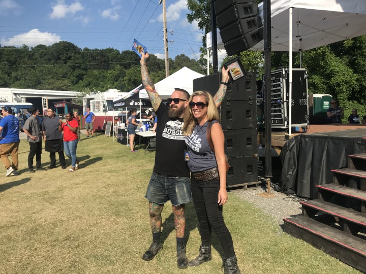 BACK ON TOP: Rankin Vault chef Scott Wallace, pictured with event organizer Kelly Denson, reclaimed his long-time position as the people's favorite at this year's WNC Battle of the Burger after an upset in 2017. Photo by Jonathan Ammons