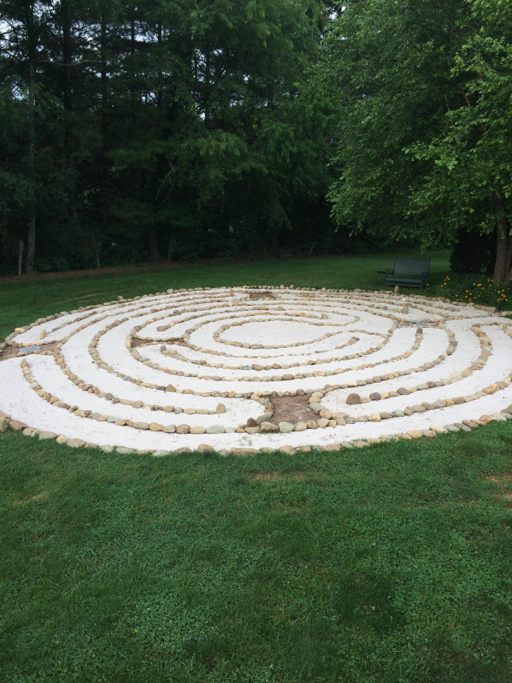 PATH OF PEACE: Weaverville resident Johanna Manasse constructed a labyrinth with river rocks and sand  in her own back yard so she could walk it daily. Photo courtesy of Manasse