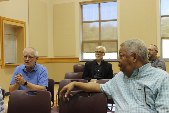 SOME THOUGHTS: Weaverville Mayor Al Root provides feedback during a county input session in Weaverville on Thursday evening. Weaverville Town Council Member Patrick Fitzsimmons and Commissioner Al Whitesides listen. Photo by David Floyd
