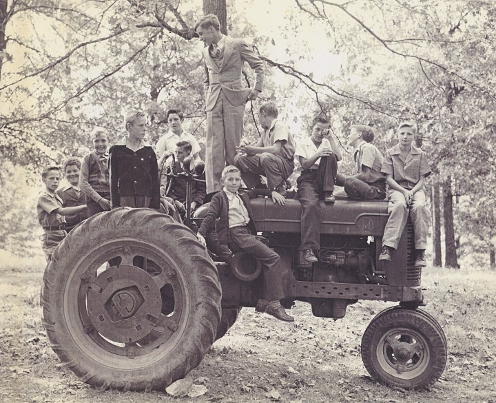 FARM LIFE: In decades past, when Eliada still operated as an orphanage, the children worked in the fields and in the Eliada Farms dairy to grow food for their own consumption and to sell. Pictured third from right is Roy Westmoreland, father of Corner Kitchen and Chestnut restaurant co-owner Kevin Westmoreland. Roy and his sister, Mae, grew up at Eliada. Photo courtesy of Eliada