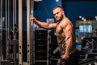 GYM RAT: Hutchinson divides his time between twice-daily sessions in the gym, his full-time job at The Inn on Biltmore Estate, meal preparation and counseling bodybuilding clients by email and phone. Photo by Brad Hutchinson