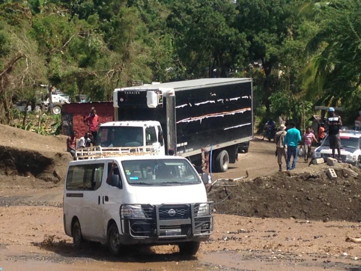 ON THE GROUND: UNCA alumna Amber Munger with The American Jewish World Service contributed this photo of hurricane  recovery efforts in southern Haiti. 