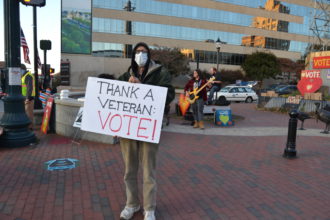 Thank a Veteran Vote sign near Vance Monument