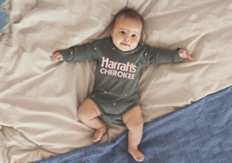 Baby in Harrah's Cherokee shirt