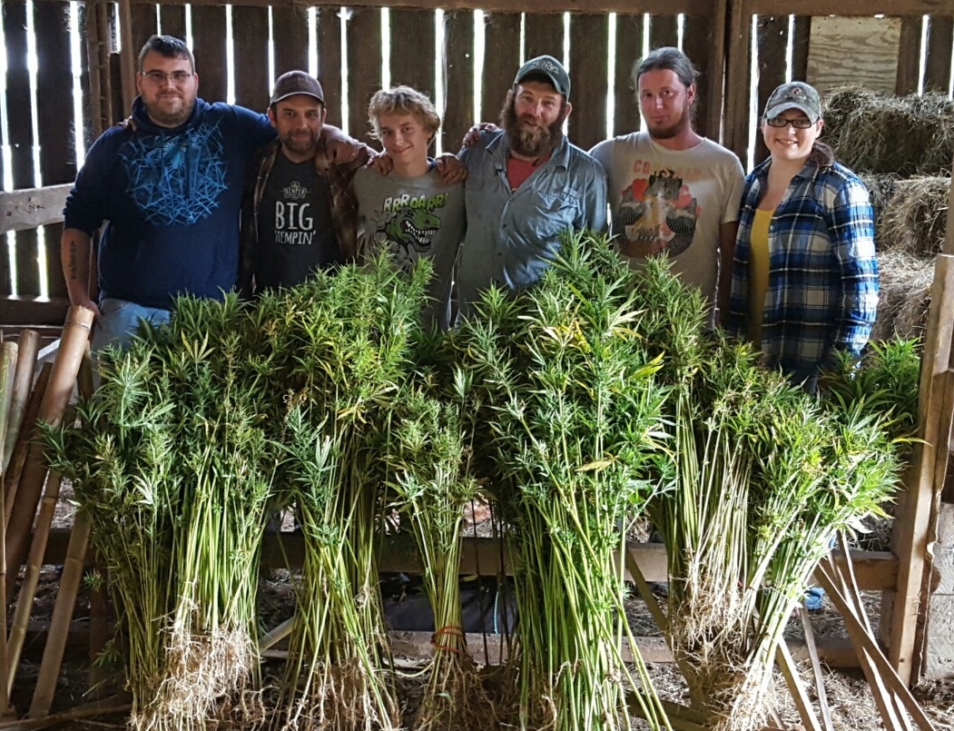 WHAT THE HEMP: Despite hemp's continued federal classification as a Schedule I controlled substance, states are allowed to enact laws surrounding the farming of industrial hemp. Smiling Hara Tempeh owner Chad Oliphant, second from left, and Kentucky farmer Mike Lewis, fourth from left, are pictured with other hemp advocates after harvesting the newly legalized crop in Kentucky. Oliphant and Lewis were introduced through Accelerating Appalachia's network of nature-based business owners.