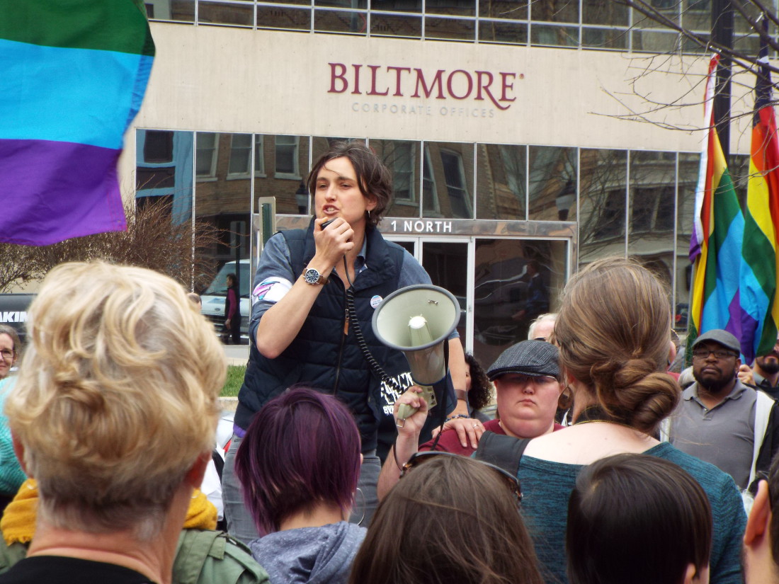 CALL TO ACTION: Jasmine Beach-Ferrara addresses the crowd at a protest of the new state law that bans local attempts to ease discrimination against LGBT individuals. Ivy Hill holds the megaphone. Photo by Able Allen