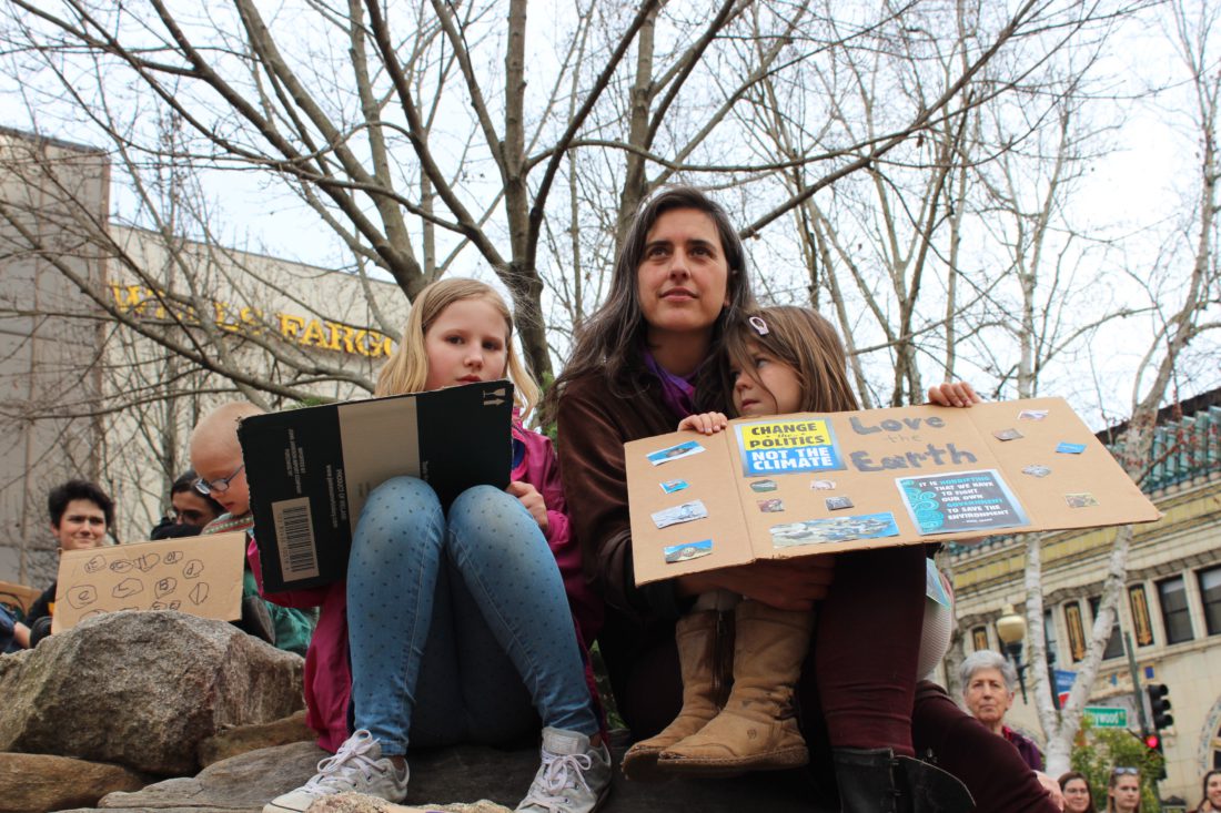 Onlookers at the Asheville Youth Climate Strike