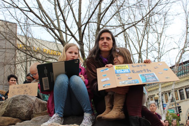 Onlookers at the Asheville Youth Climate Strike
