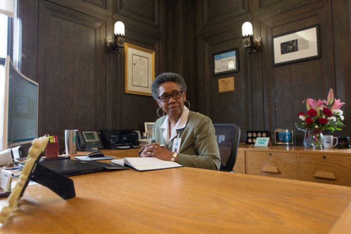 Debra Campbell at desk