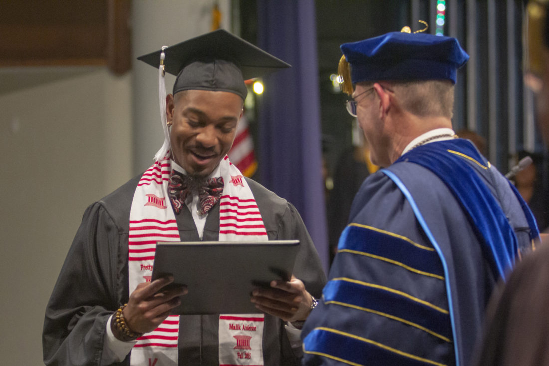 Malik Anderson receives diploma