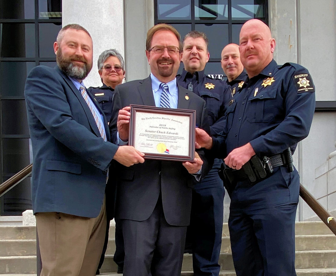 Chuck Edwards receiving 2019 Defender of Public Safety Award
