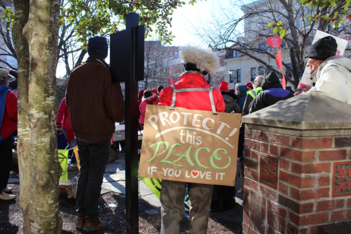 "Protect this place if you love it" protest sign
