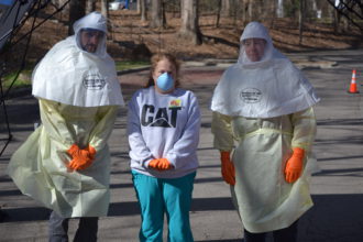 Buncombe County workers in personal protective equipment