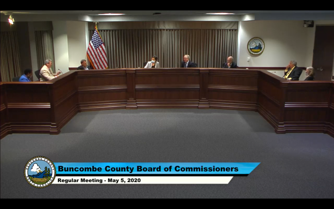 Penland speaking at the May 5 Buncombe County Board of Commissioners meeting