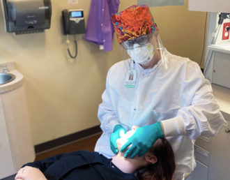 MAHEC dentist with personal protective equipment