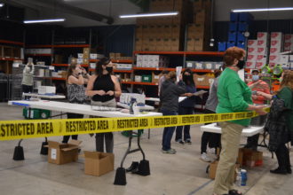Officials return voting equipment to the Buncombe County Election Services warehouse in downtown Asheville.