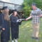 Claire Bowling, left, and Amelia Darnell receive their high school diplomas from Parkview Academy Principal Chuck Bowling